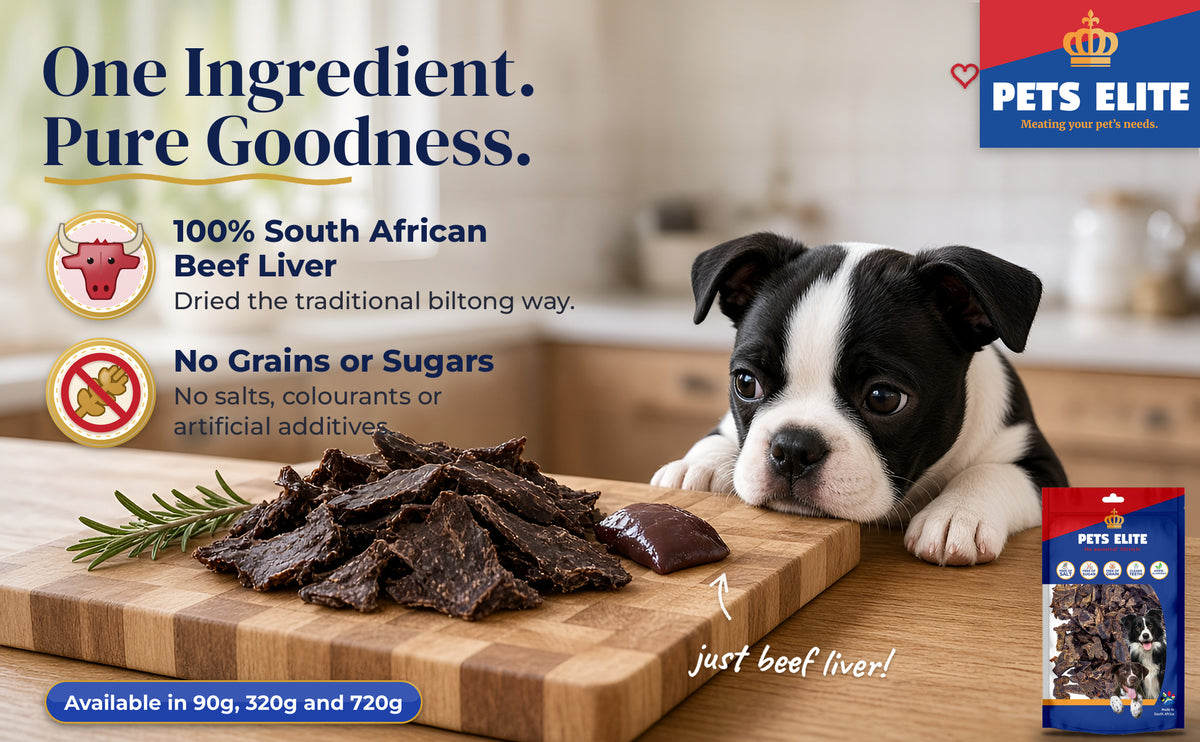 Boston Terrier puppy eyeing a pile of liver biltong on a wooden board, with the Pets Elite pack