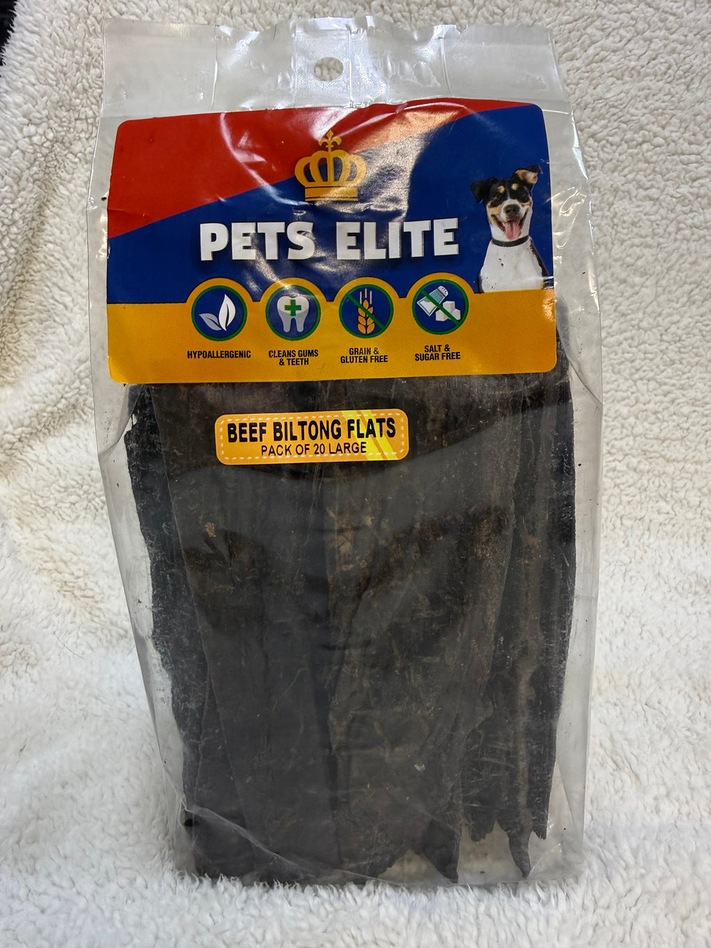Pets Elite Beef Biltong Flats Pack of 20 Large, pack photographed in hand (view 2 of 3) — air-dried beef biltong dog chew from Snout & Swagger