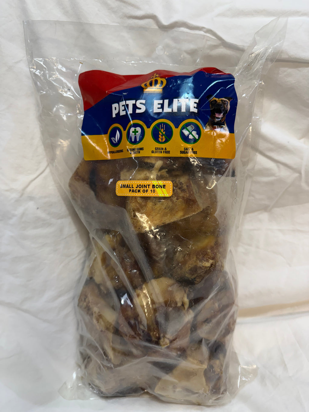 Pets Elite Beef Joint Bone Pack of 10, pack photographed in hand (view 3 of 3) — natural beef joint bone dog chew from Snout & Swagger
