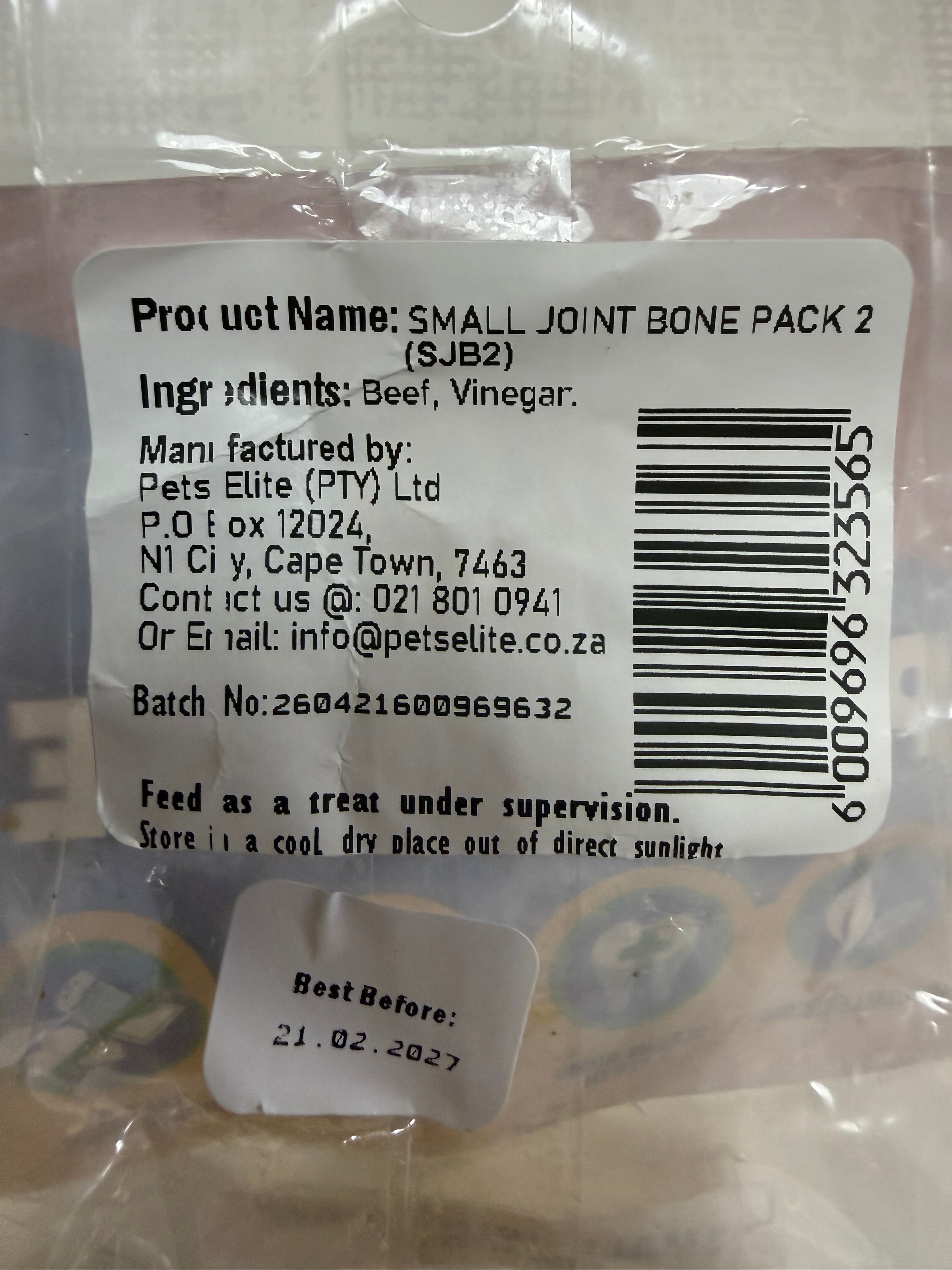 Pets Elite Beef Joint Bone Pack of 2, back of pack showing ingredients and feeding guide (view 1 of 2) — natural beef joint bone dog chew from Snout & Swagger