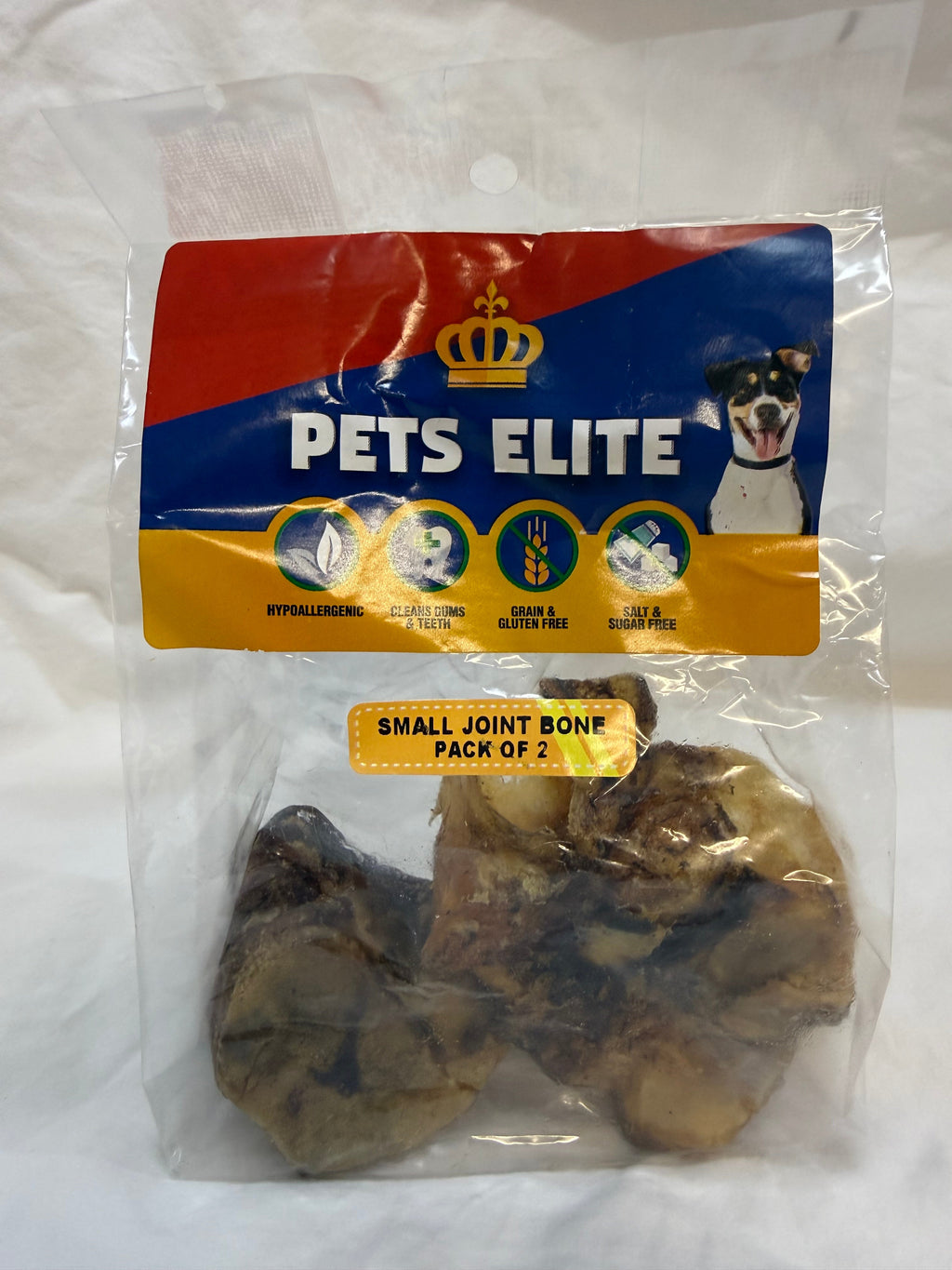 Pets Elite Beef Joint Bone Pack of 2, pack photographed in hand (view 1 of 2) — natural beef joint bone dog chew from Snout & Swagger