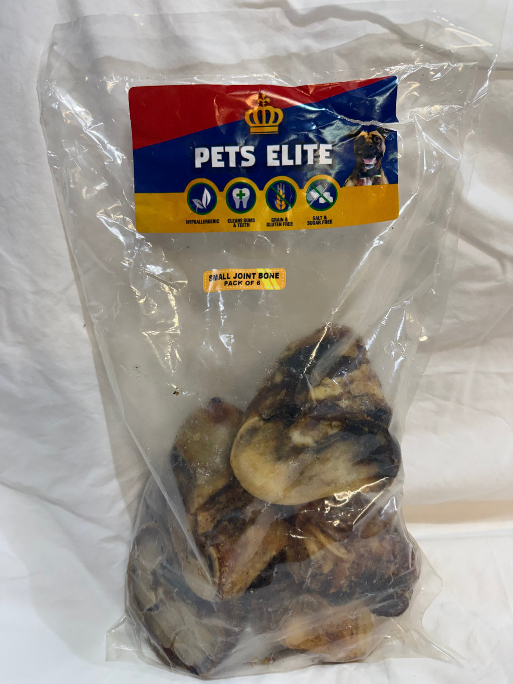 Pets Elite Beef Joint Bone Pack of 6, pack photographed in hand (view 1 of 3) — natural beef joint bone dog chew from Snout & Swagger