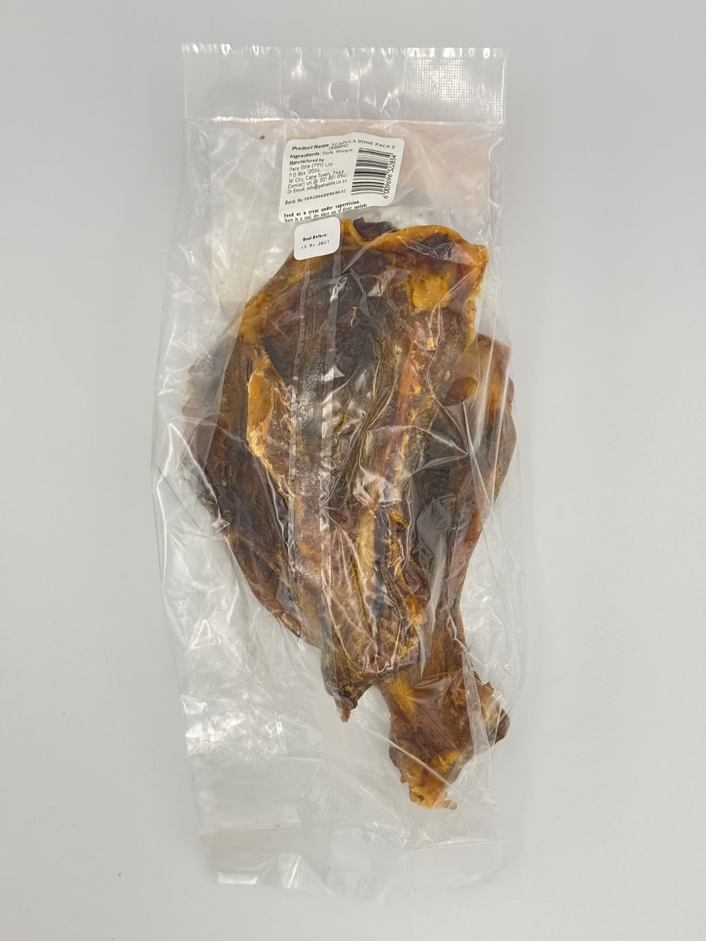 Pets Elite Scapula Bone, back of pack showing ingredients and feeding guide — natural scapula bone dog chew from Snout & Swagger