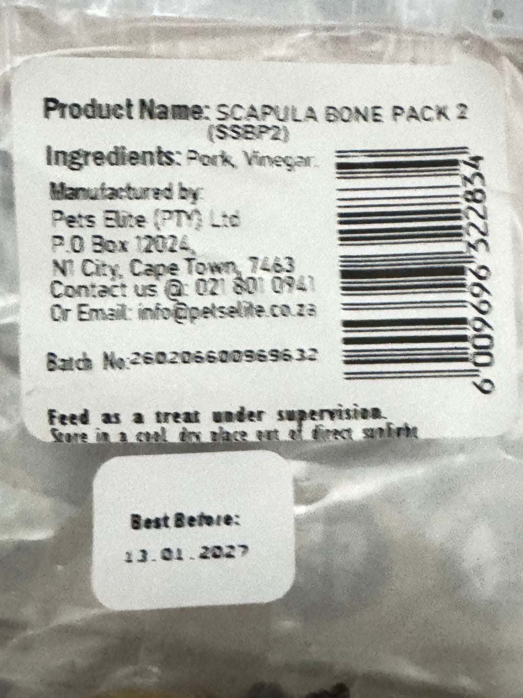 Pets Elite Scapula Bone Pack of 2, back of pack showing ingredients and feeding guide (view 1 of 2) — natural scapula bone dog chew from Snout & Swagger