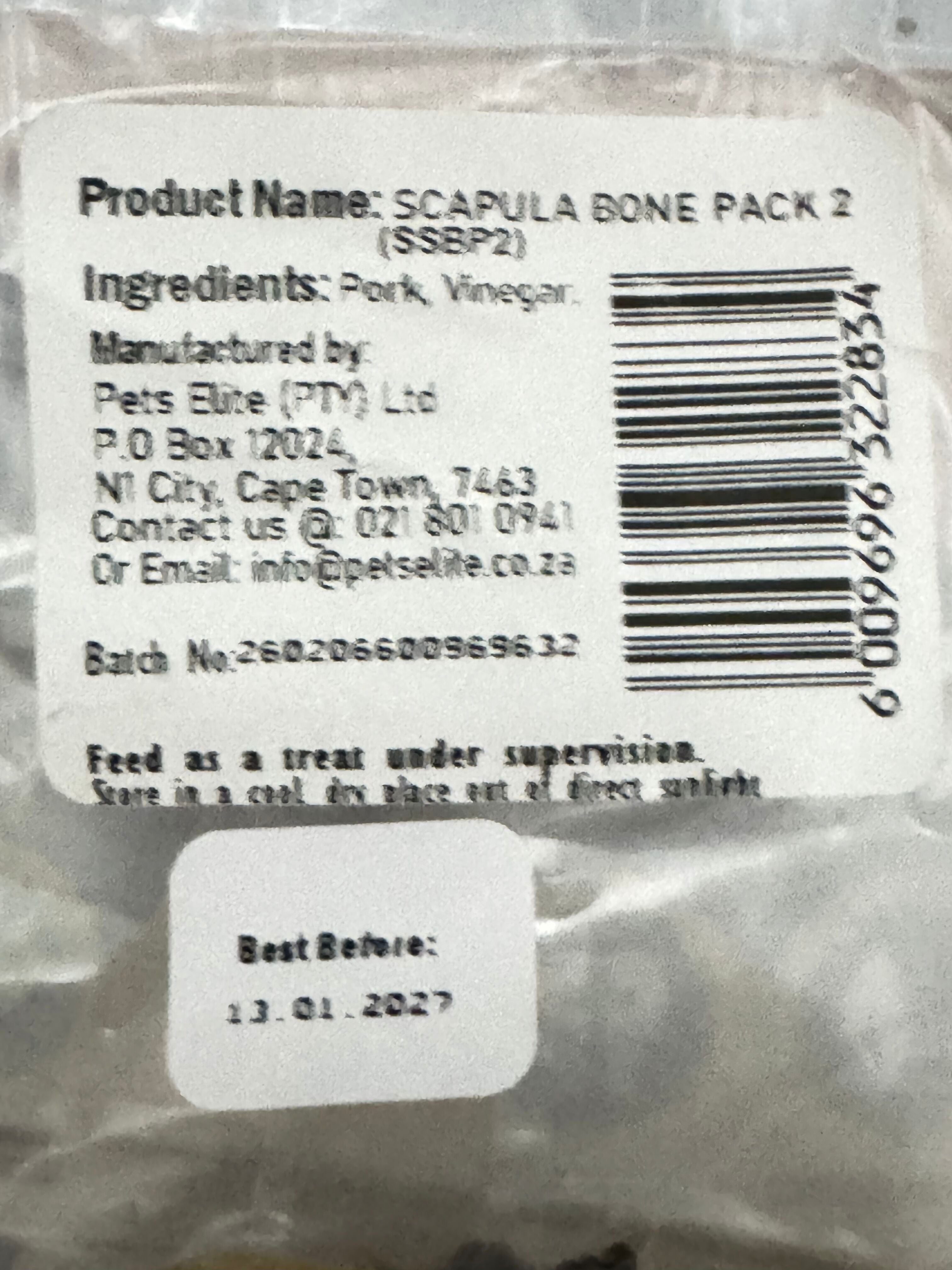 Pets Elite Scapula Bone Pack of 2, back of pack showing ingredients and feeding guide (view 1 of 2) — natural scapula bone dog chew from Snout & Swagger