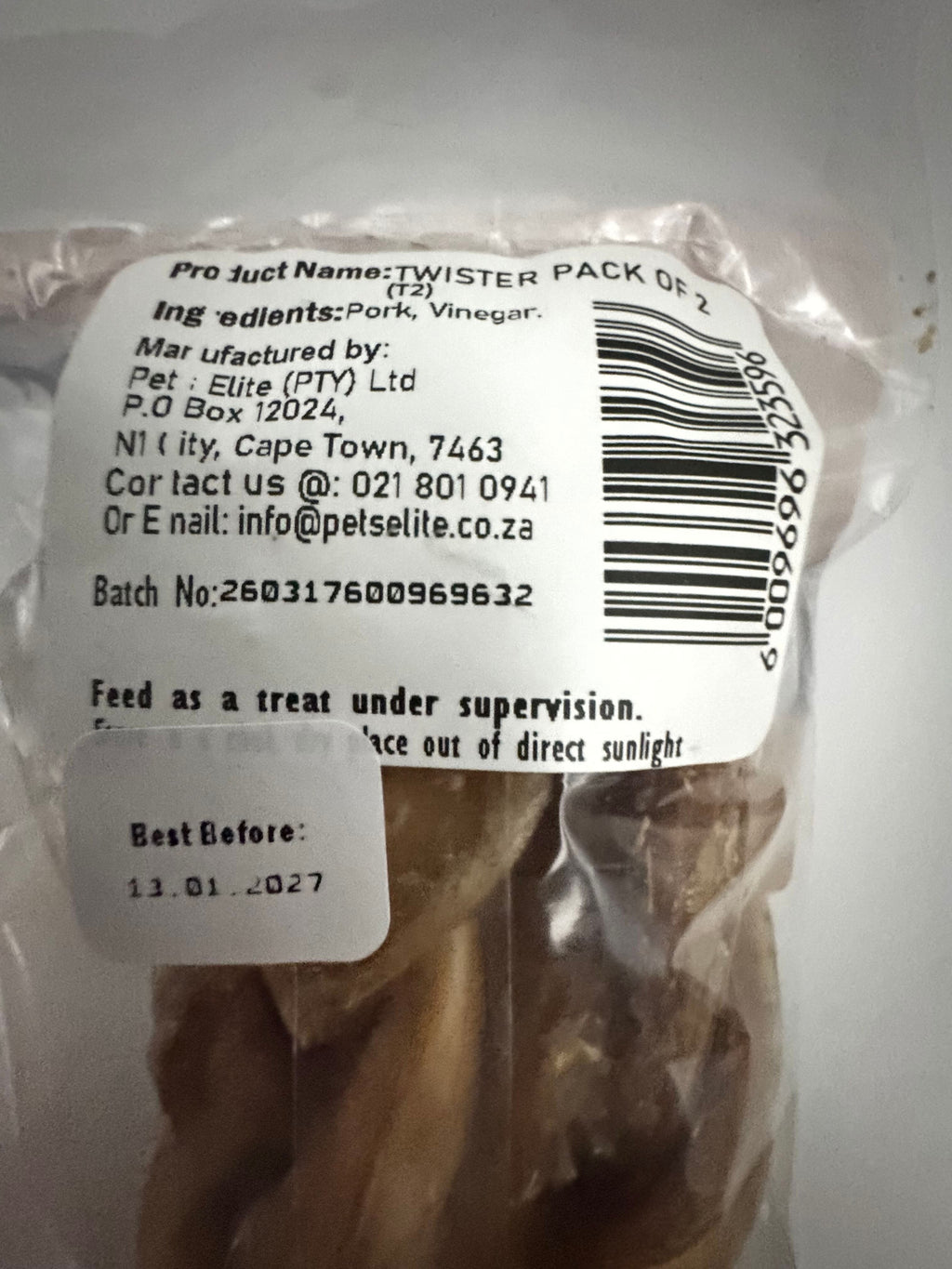 Pets Elite Twister Pack of 2, back of pack showing ingredients and feeding guide (view 2 of 4) — twisted pork twister dog chew from Snout & Swagger